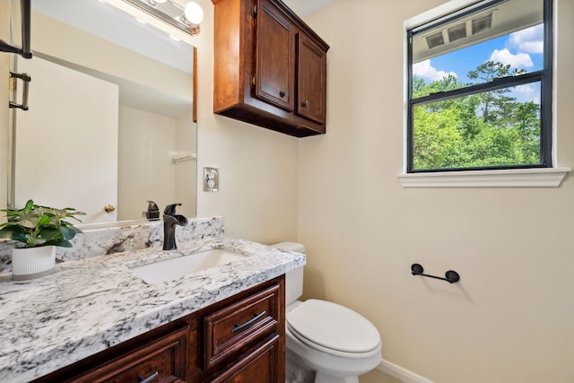 40206 Colfax Rd, Magnolia, TX 77354 - full bath with toilet, vanity, baseboards, and a shower