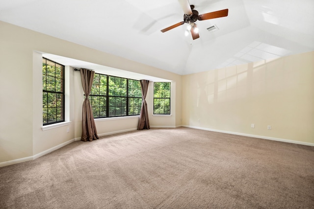 40206 Colfax Rd, Magnolia, TX 77354 - spare room with plenty of natural light, carpet, ceiling fan, baseboards, and lofted ceiling