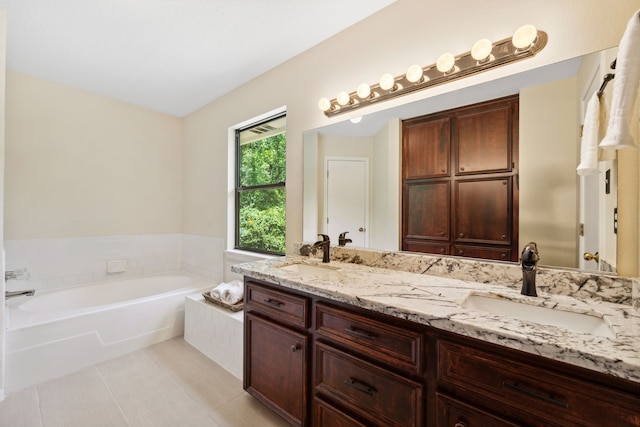 40206 Colfax Rd, Magnolia, TX 77354 - full bath with tile patterned flooring, a garden tub, and double vanity