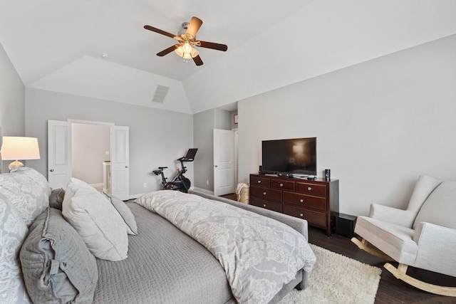 bedroom with visible vents, dark wood-style flooring, ceiling fan, and lofted ceiling