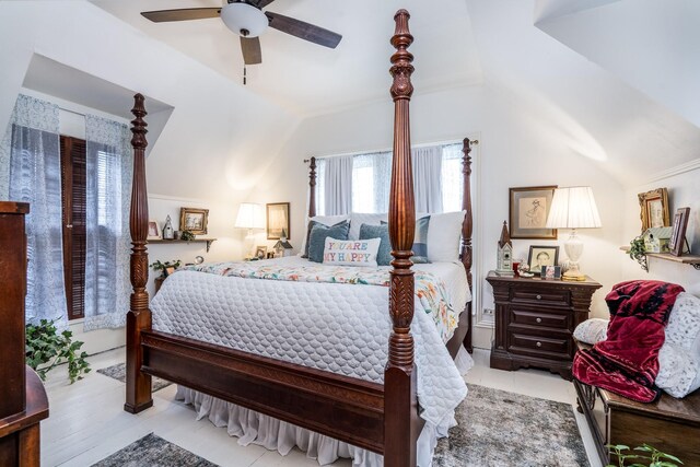 bedroom featuring a ceiling fan and vaulted ceiling