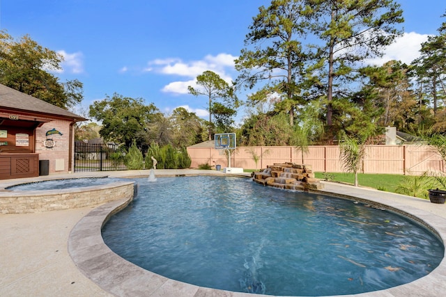 view of swimming pool featuring a fenced in pool, an in ground hot tub, and fence