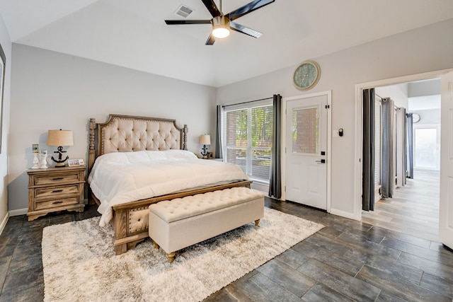 bedroom with visible vents, baseboards, vaulted ceiling, and access to exterior