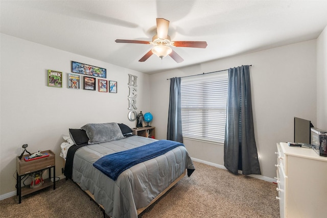 bedroom with carpet floors, a ceiling fan, and baseboards