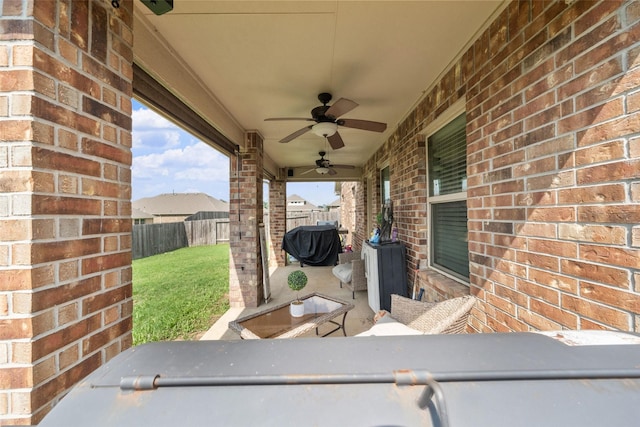 view of patio / terrace featuring a ceiling fan and a fenced backyard