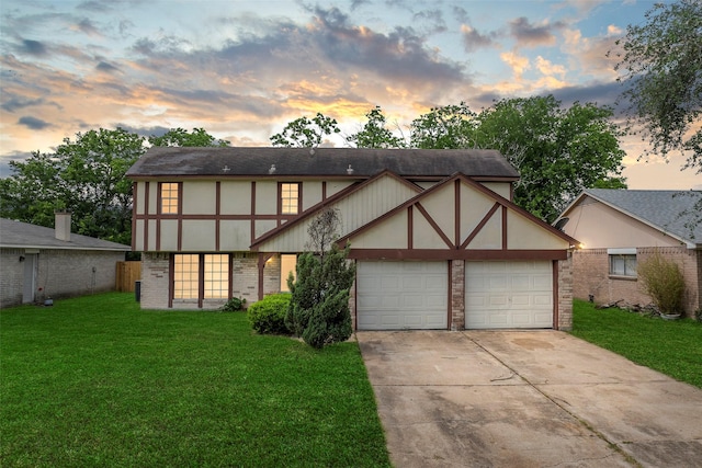 4027 Brookhead Trl, Houston, TX 77066 - view of front of home featuring concrete driveway, brick siding, a front yard, and a garage