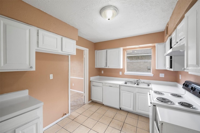 4027 Brookhead Trl, Houston, TX 77066 - kitchen with white appliances, white cabinetry, a sink, and light countertops