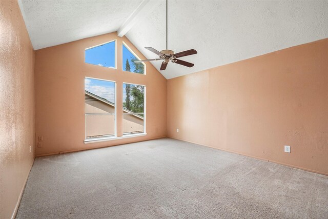 4027 Brookhead Trl, Houston, TX 77066 - carpeted empty room with vaulted ceiling with beams, a textured ceiling, and ceiling fan