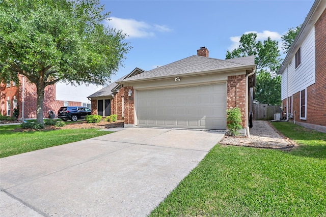 ranch-style home featuring a chimney, concrete driveway, a front yard, and brick siding