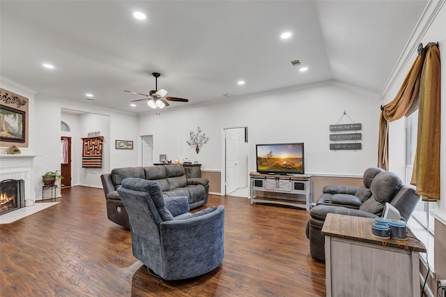 living area featuring a ceiling fan, crown molding, a fireplace with flush hearth, dark wood-style floors, and lofted ceiling