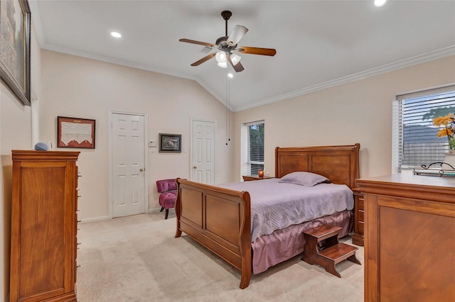bedroom featuring crown molding, multiple windows, vaulted ceiling, and light colored carpet