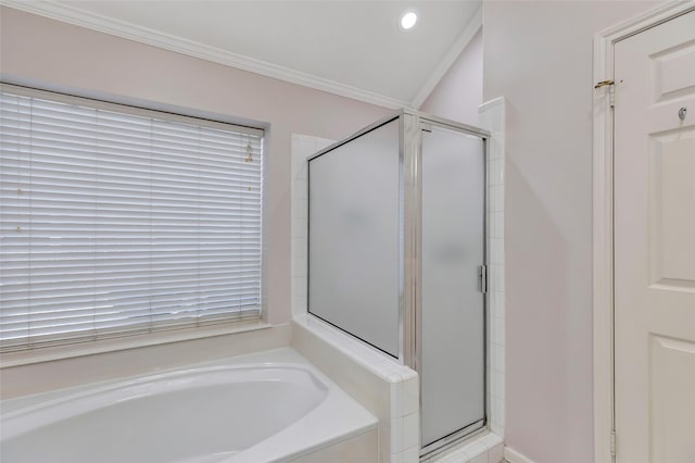 bathroom featuring recessed lighting, ornamental molding, a garden tub, and a stall shower