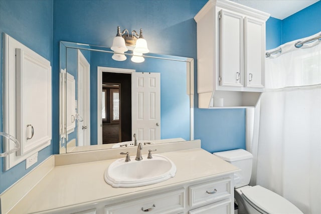 1623 Scenic Shore Dr, Kingwood, TX 77345 - bathroom with toilet, a chandelier, and vanity