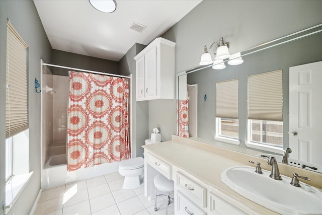 1623 Scenic Shore Dr, Kingwood, TX 77345 - full bath featuring visible vents, vanity, toilet, shower / bathtub combination with curtain, and tile patterned floors