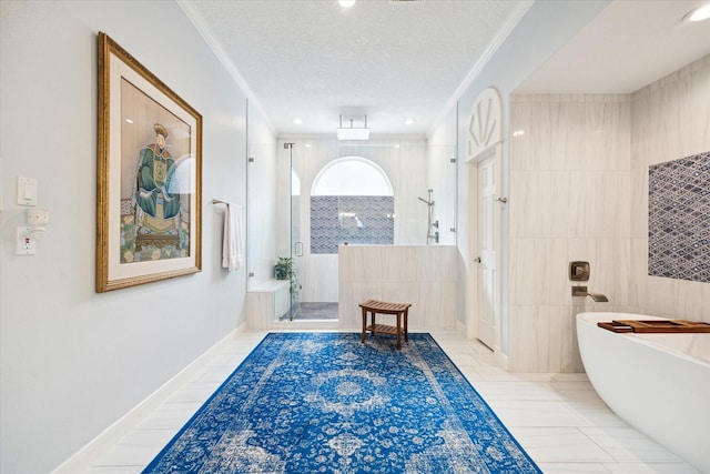 1623 Scenic Shore Dr, Kingwood, TX 77345 - bathroom featuring crown molding, tile patterned flooring, a freestanding tub, a textured ceiling, and a stall shower