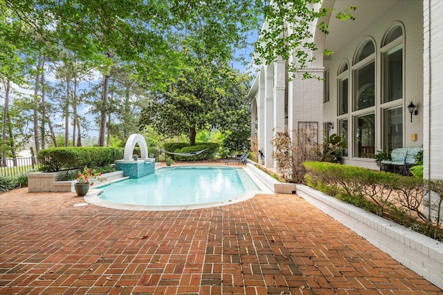 1623 Scenic Shore Dr, Kingwood, TX 77345 - view of swimming pool featuring a fenced in pool and a patio