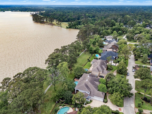 1623 Scenic Shore Dr, Kingwood, TX 77345 - bird's eye view with a water view and a forest view