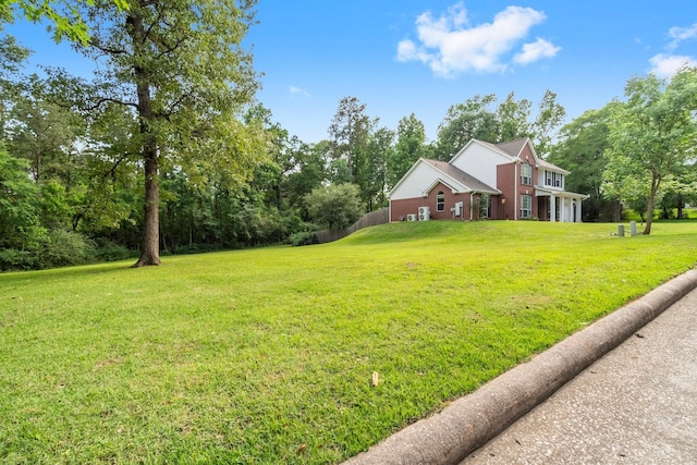 view of yard with fence
