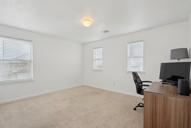 25404 Devonshire Knoll St, Katy, TX 77493 - home office featuring baseboards, light colored carpet, and visible vents