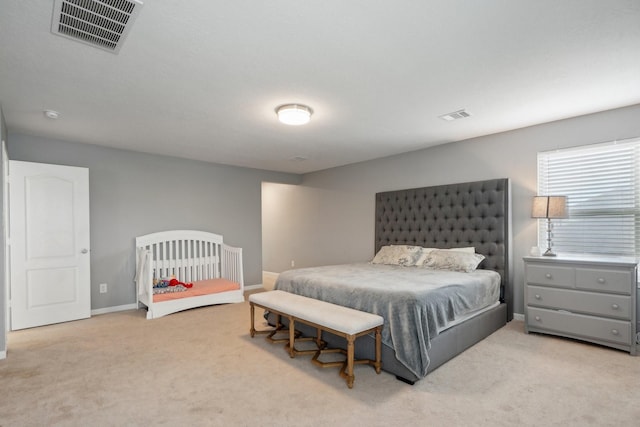 25404 Devonshire Knoll St, Katy, TX 77493 - bedroom with light colored carpet, baseboards, and visible vents