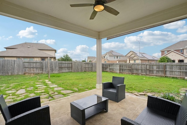 25404 Devonshire Knoll St, Katy, TX 77493 - view of patio / terrace with a fenced backyard, a ceiling fan, and a residential view