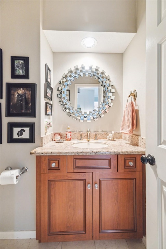 bathroom featuring vanity and tile patterned flooring