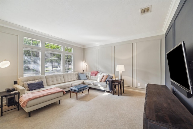 carpeted living area with ornamental molding, a decorative wall, and visible vents