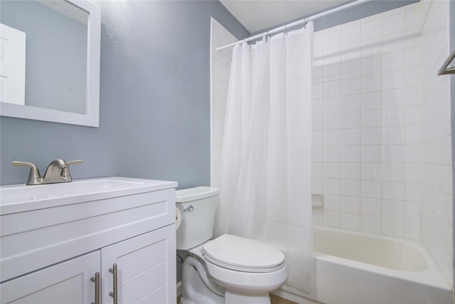 bathroom with vanity, shower / bathtub combination with curtain, and toilet