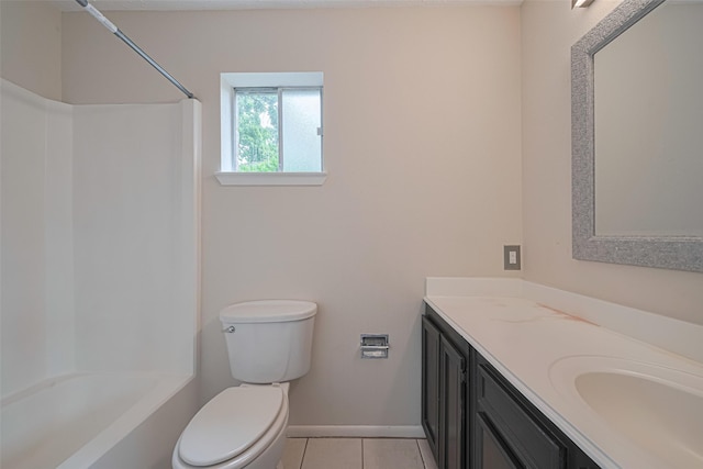 full bath with tile patterned flooring, vanity, shower / bathtub combination, toilet, and baseboards