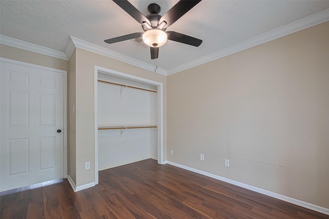 unfurnished bedroom with baseboards, a ceiling fan, a closet, and dark wood-type flooring