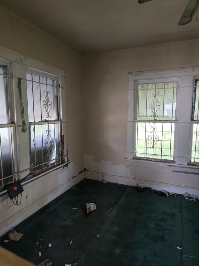 unfurnished room featuring a wealth of natural light