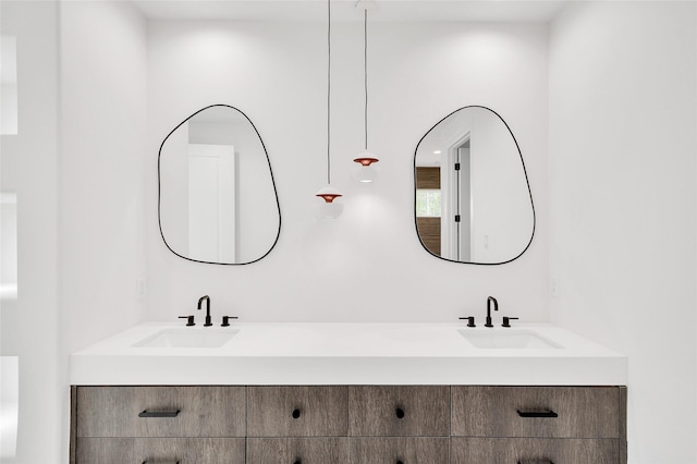 bathroom with double vanity and a sink