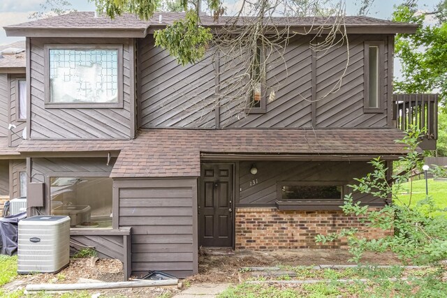 view of front of home with brick siding