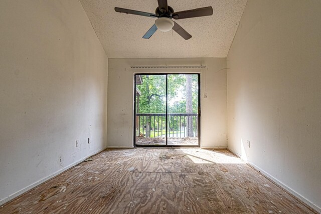 spare room featuring ceiling fan and lofted ceiling