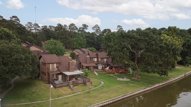 bird's eye view with a water view