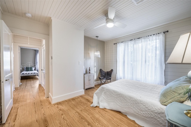 303 S Mechanic St, Fayetteville, TX 78940 - bedroom with baseboards, ornamental molding, light wood finished floors, and a ceiling fan