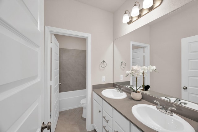 full bath featuring tile patterned flooring, a sink, visible vents, and toilet
