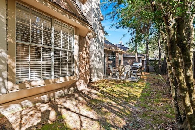 2 Skyland Pl, The Woodlands, TX 77381 - view of yard with a patio