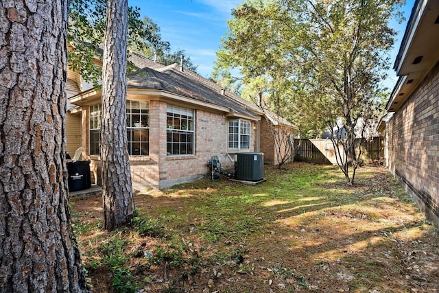 2 Skyland Pl, The Woodlands, TX 77381 - view of yard featuring central air condition unit