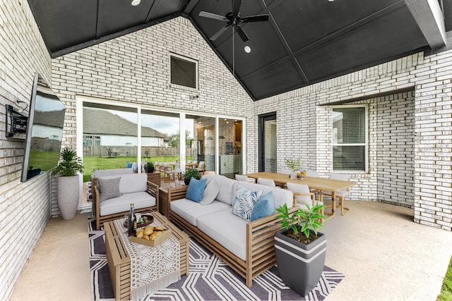 view of patio / terrace with an outdoor living space, outdoor dining area, and ceiling fan