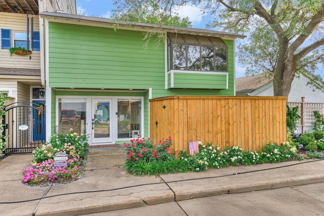 exterior space with a gate and fence