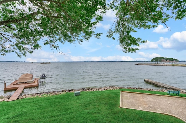 property view of water with a dock
