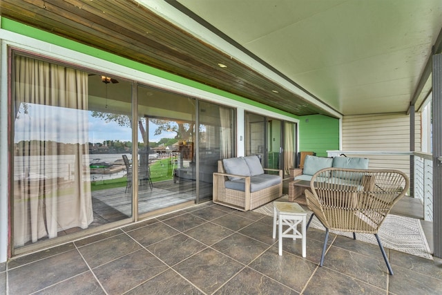 sunroom with an outdoor hangout area