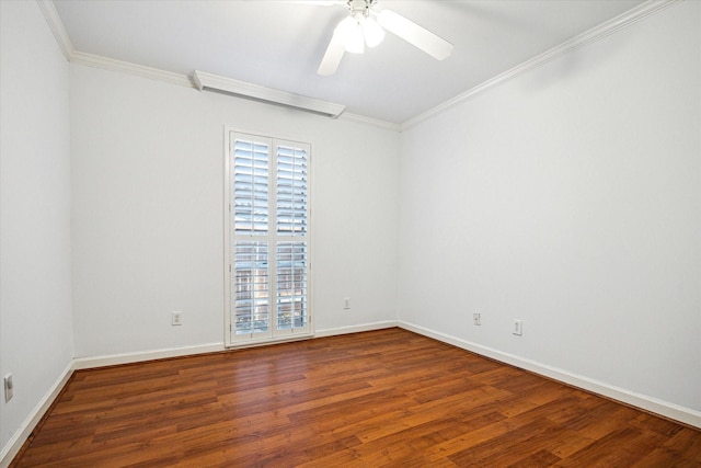 empty room featuring a ceiling fan, baseboards, crown molding, and wood finished floors