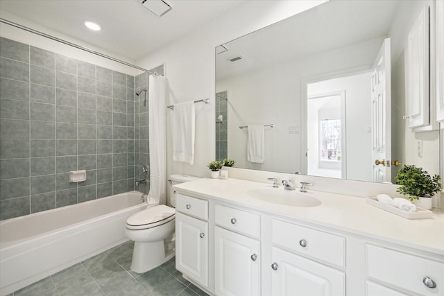full bath featuring shower / bath combination with curtain, toilet, tile patterned floors, visible vents, and vanity