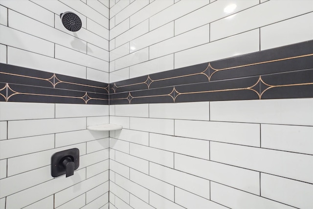 details featuring a tile shower