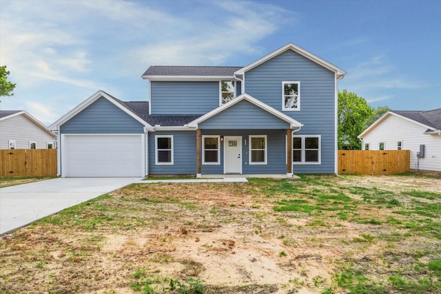 traditional home with concrete driveway, fence, covered porch, and a garage