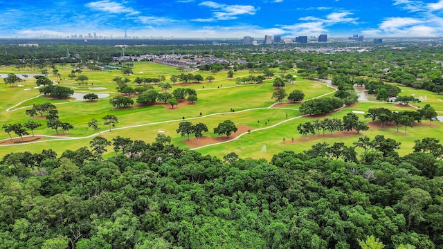 bird's eye view featuring a city view and golf course view