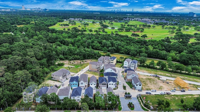 aerial view featuring golf course view and a residential view