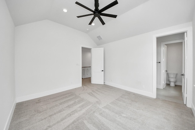 unfurnished bedroom featuring recessed lighting, baseboards, light colored carpet, and lofted ceiling